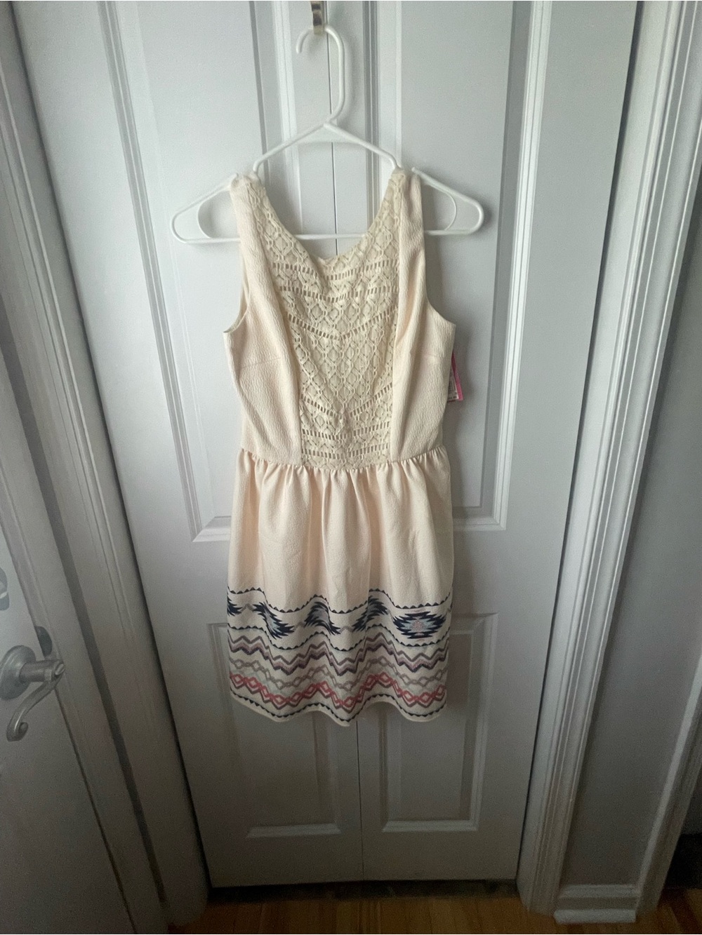 Cream Crochet Bodice Dress with Blue & Pink Embroidered Hem